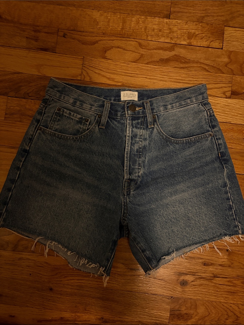 Z Supply Raw Hem High-Rise Denim Shorts in Mid Blue